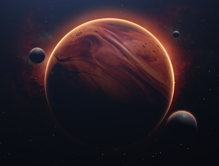 A large, swirling planet with a reddish-brown surface and visible atmospheric bands, accompanied by several smaller moons. The scene conveys a sense of vastness and mystery, with stars scattered in the dark backdrop of space.