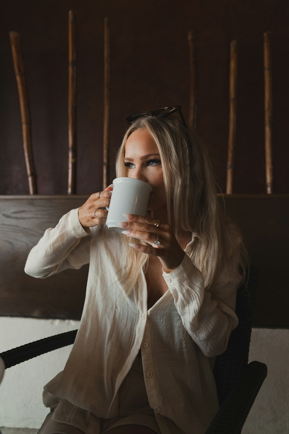 a person holding a cup