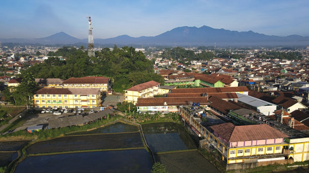 a city with a tower in the background