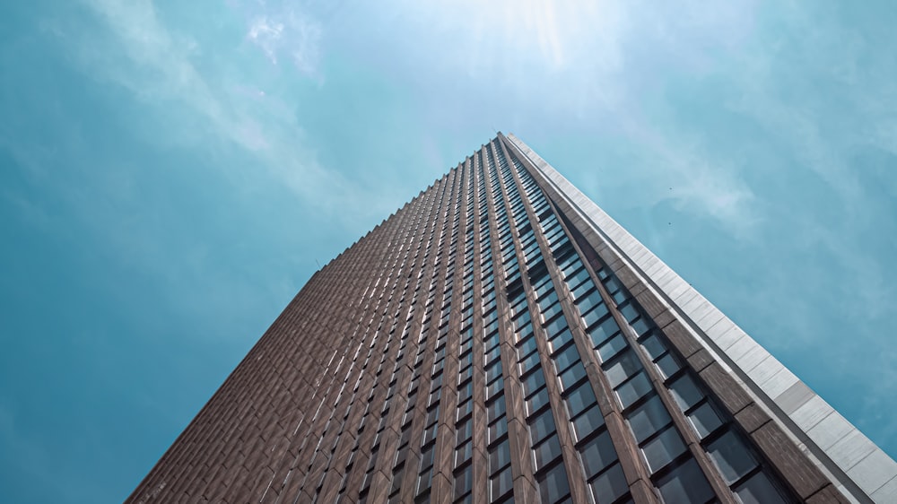 a tall building with a blue sky