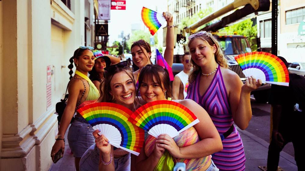 a group of women holding flags