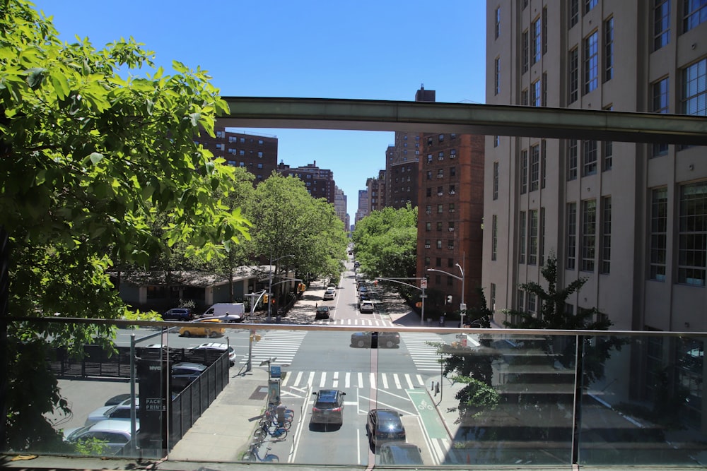 a street with cars and trees