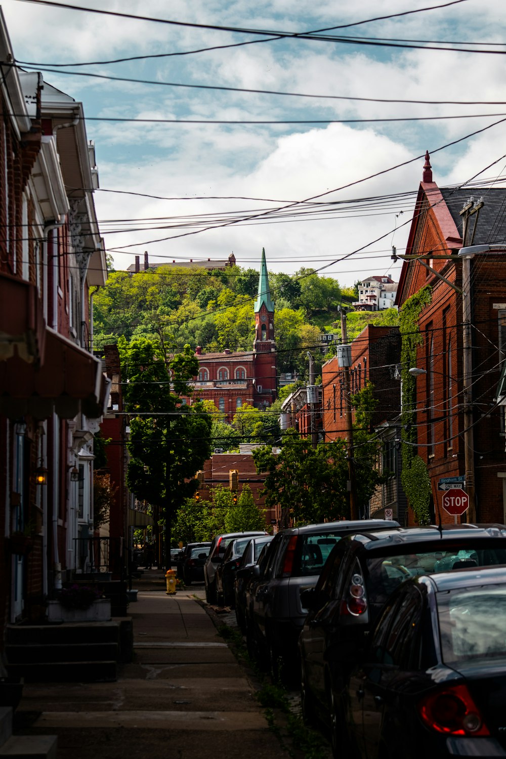 cars parked on the side of a street