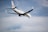 a large airplane flying in the sky