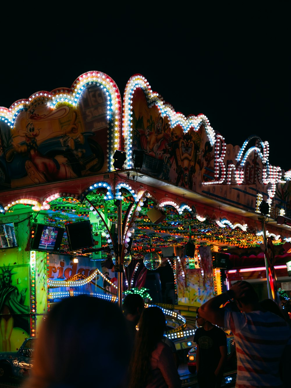 a group of people at a carnival