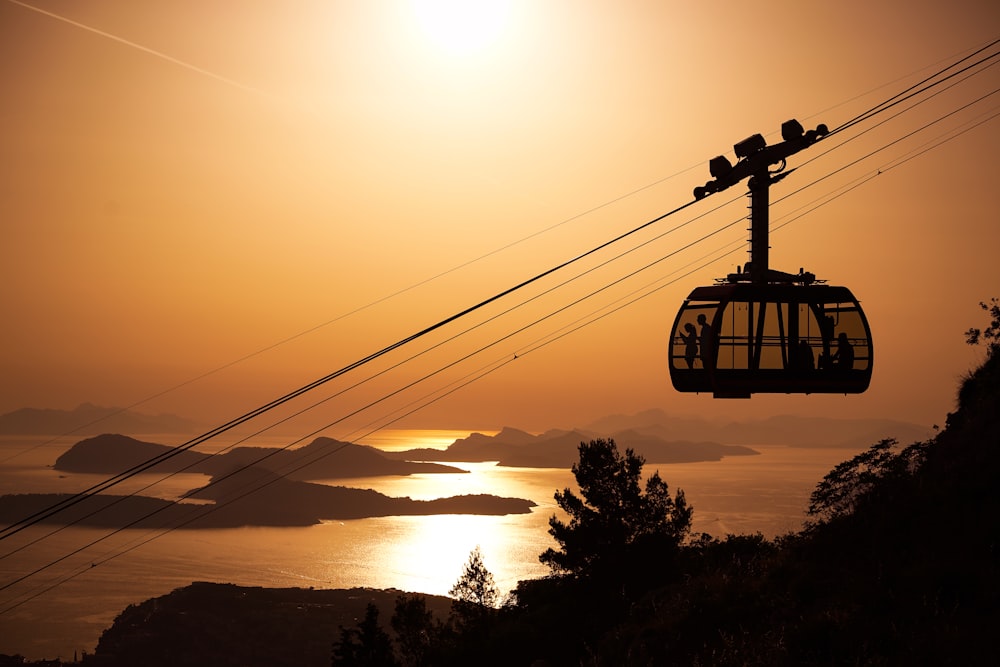 a ski lift going up a mountain