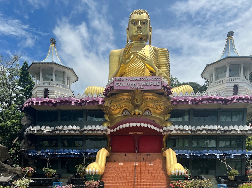 a large statue in front of a building