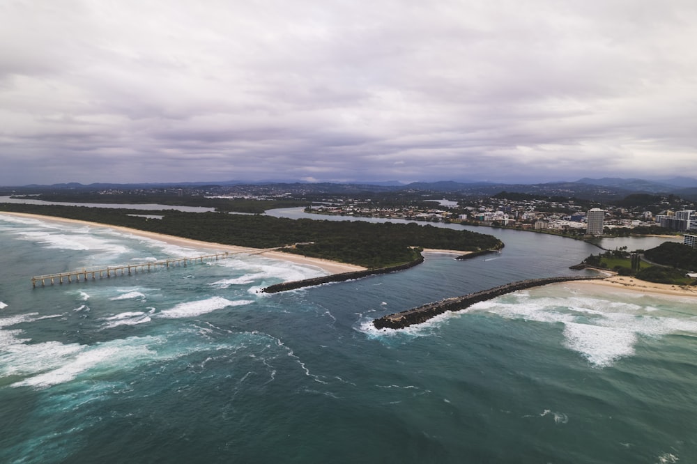 a beach with a body of water