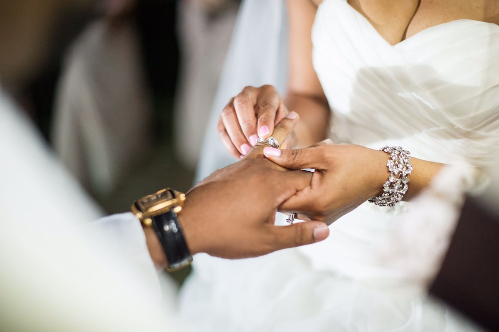 a woman and a man holding hands