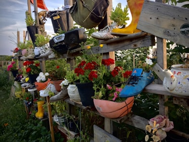A collection of garden accessories displayed in a vibrant garden.