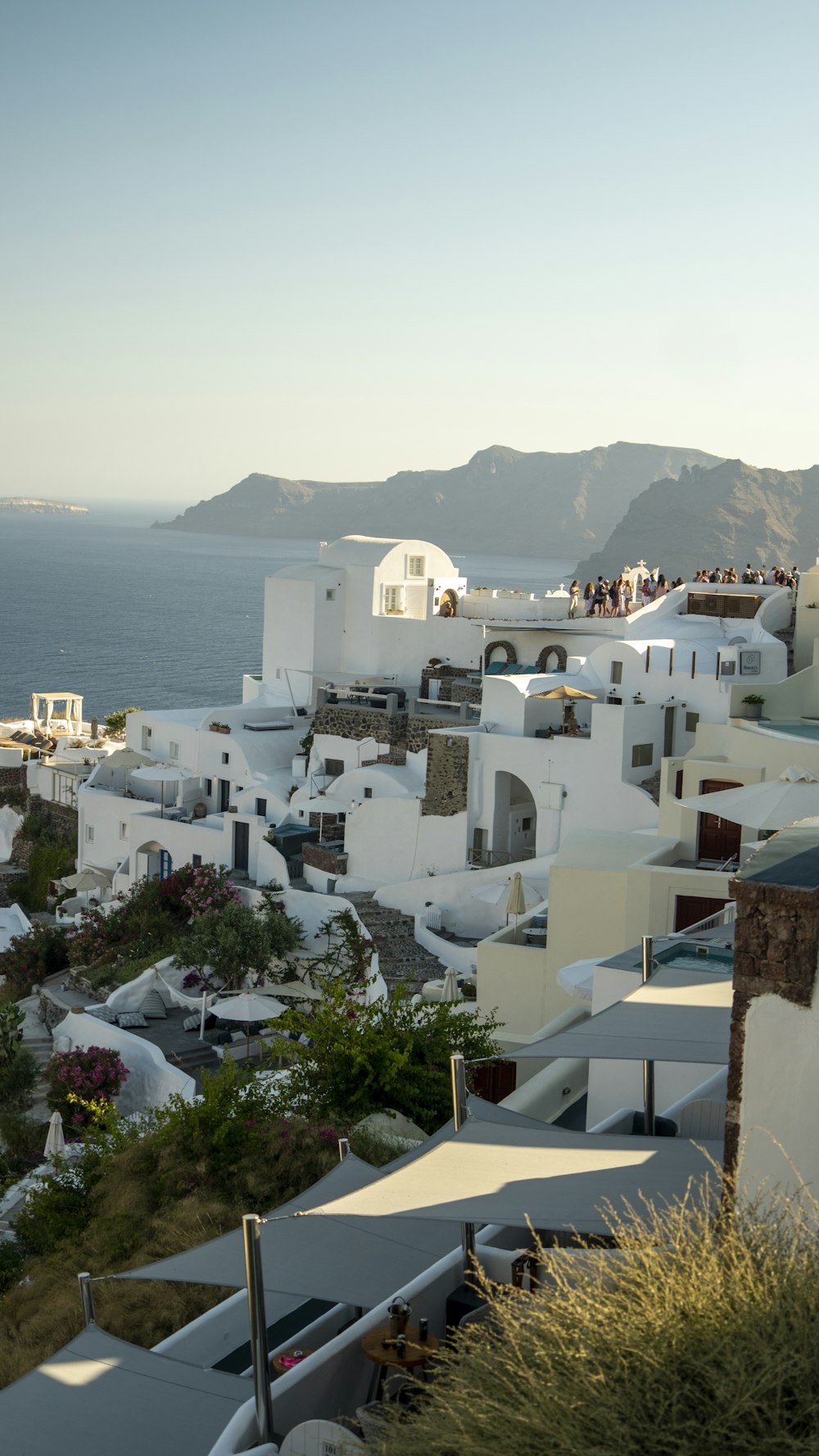 a group of buildings next to a body of water