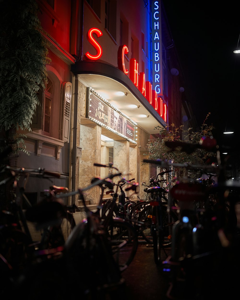 a group of bicycles parked outside a building