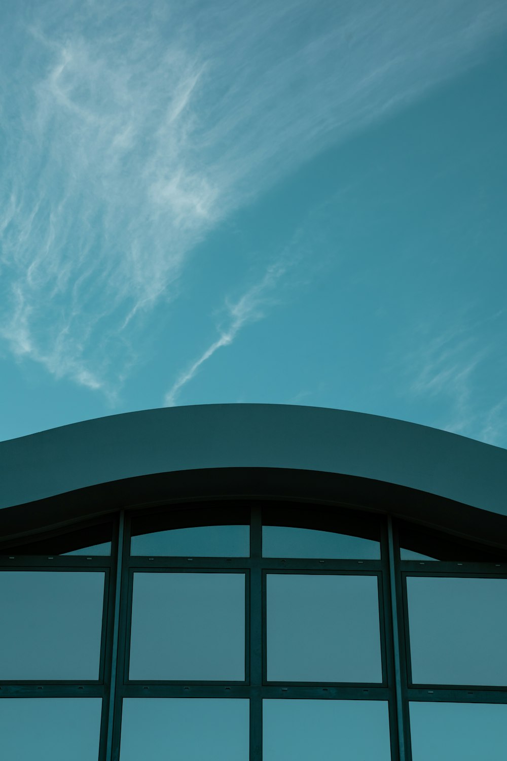 a blue sky above a building