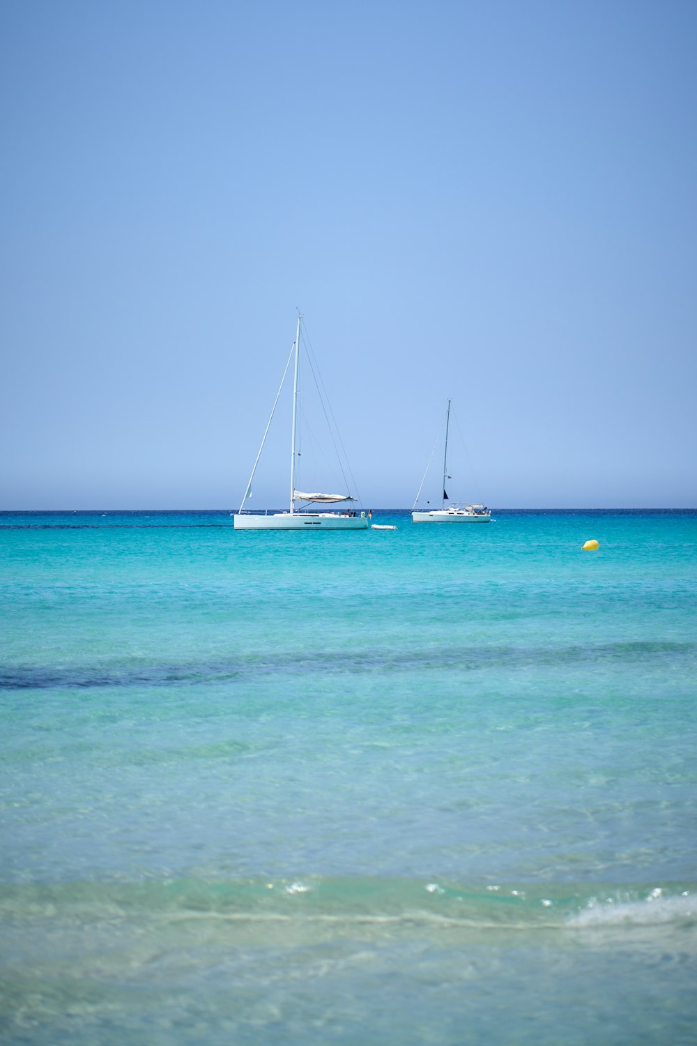 a couple of boats in the ocean