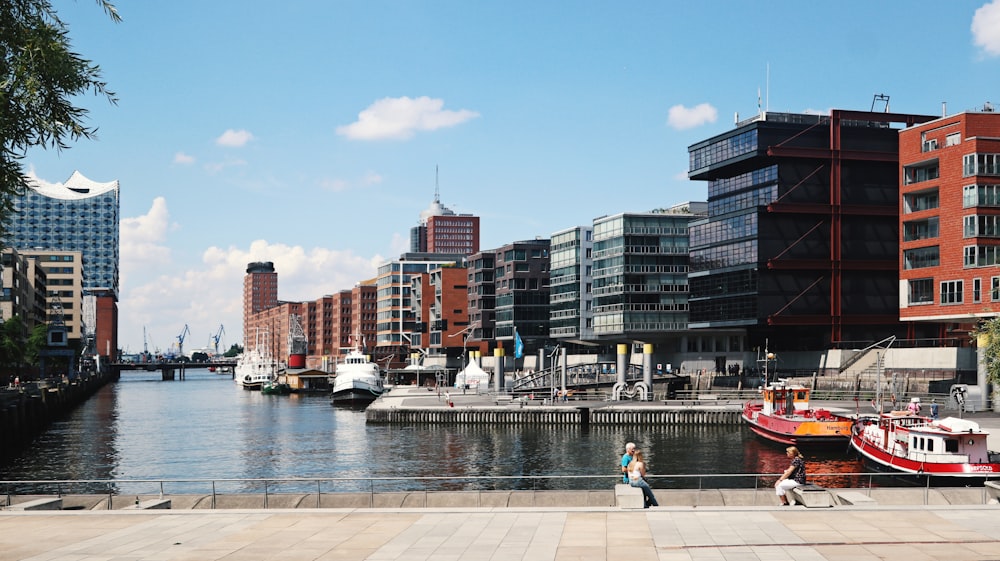 a body of water with boats and buildings around it