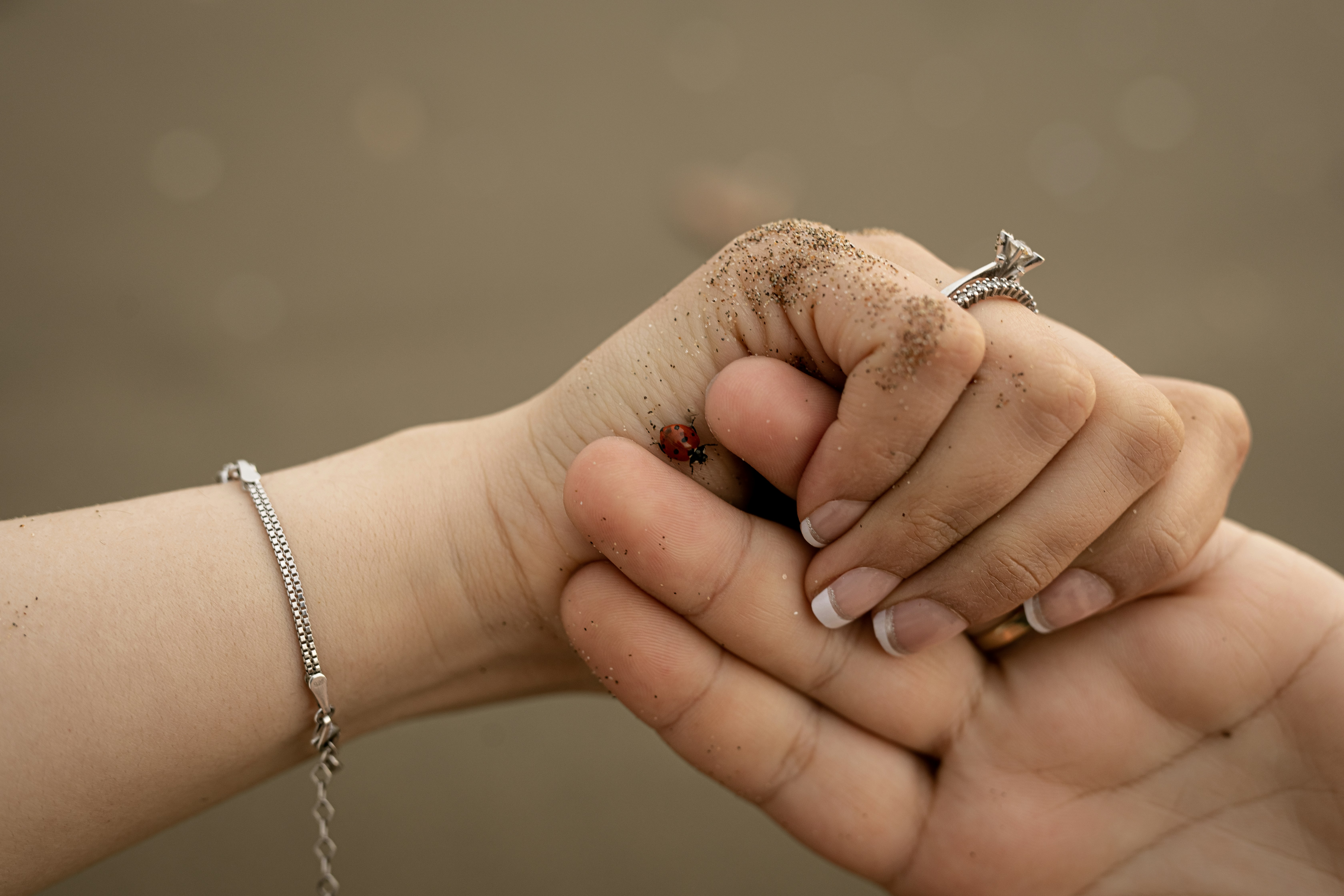 a person holding a small animal