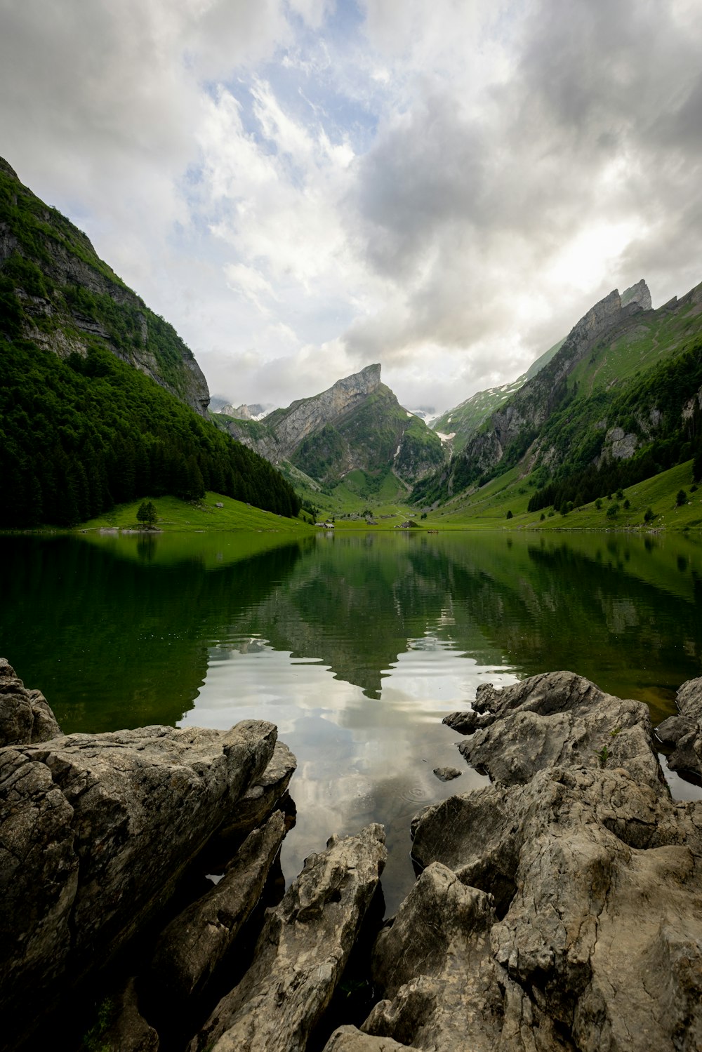 a lake surrounded by mountains