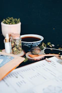 Neatly arranged supplements and herbal teas on a wooden table.