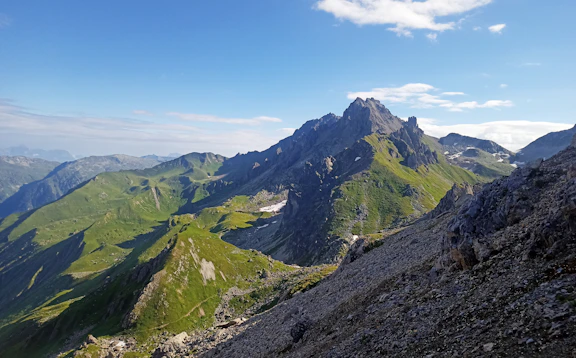 a mountain range with a valley below