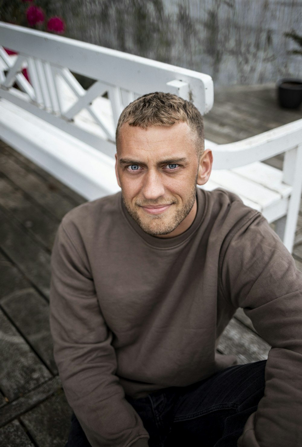 a man sitting on a deck