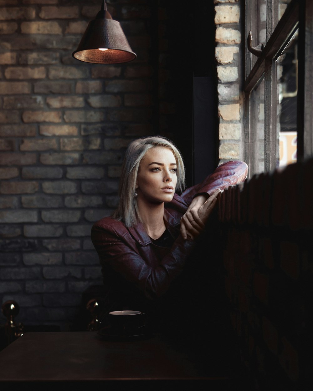 a woman sitting at a table