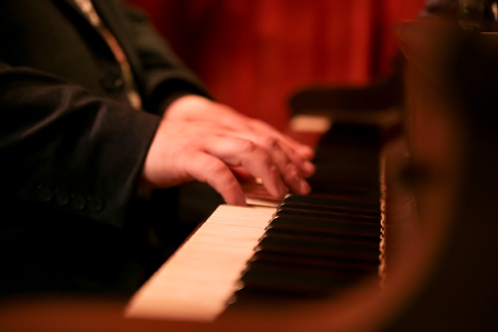 a person playing a piano