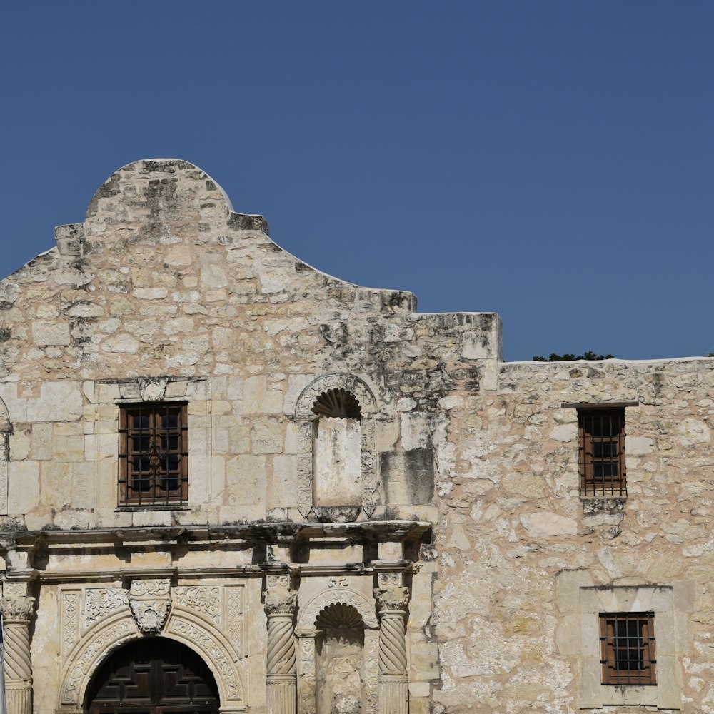 a stone building with windows