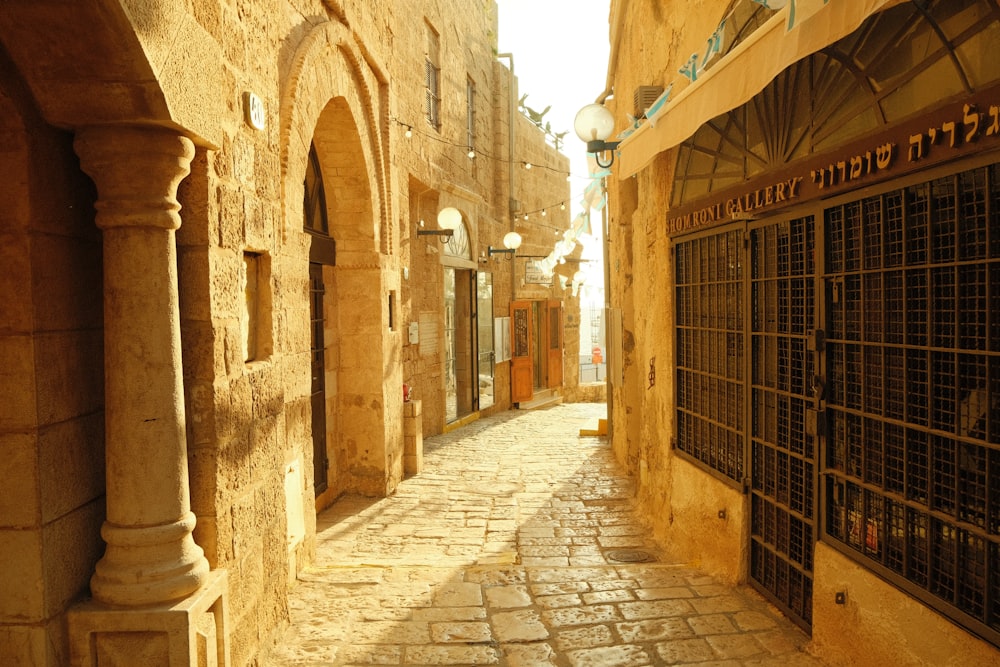 a narrow alley between two buildings