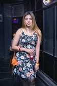 a person in a floral dress
