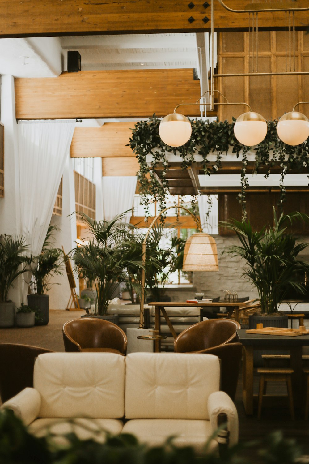 a room with a chandelier and chairs