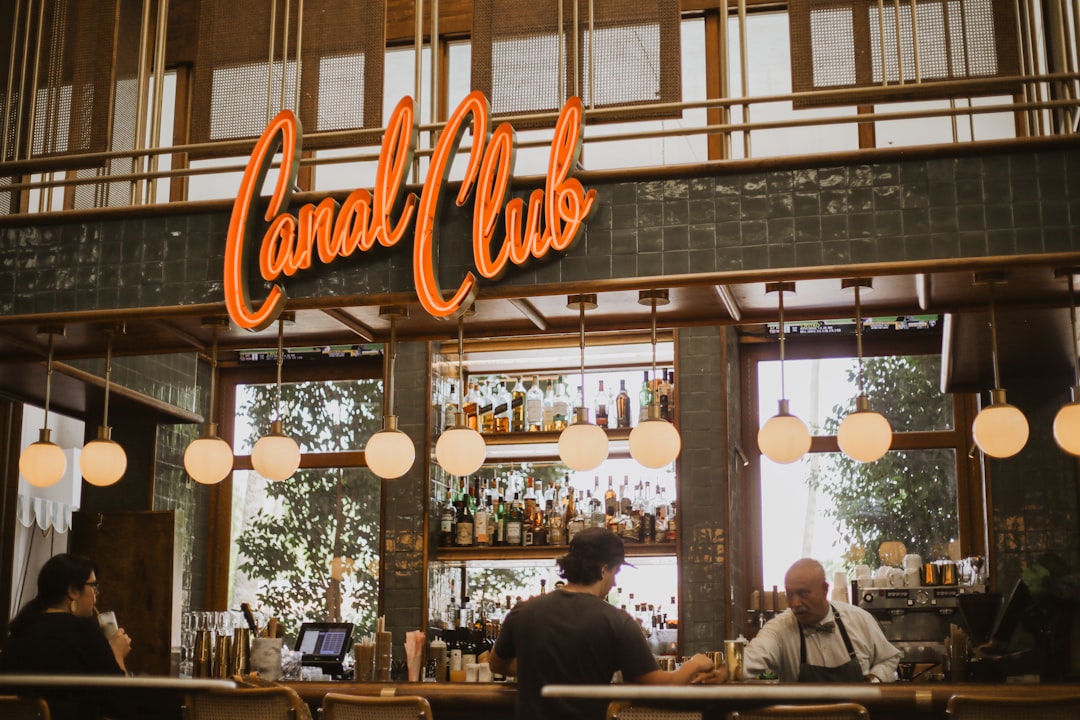 a restaurant with a sign,