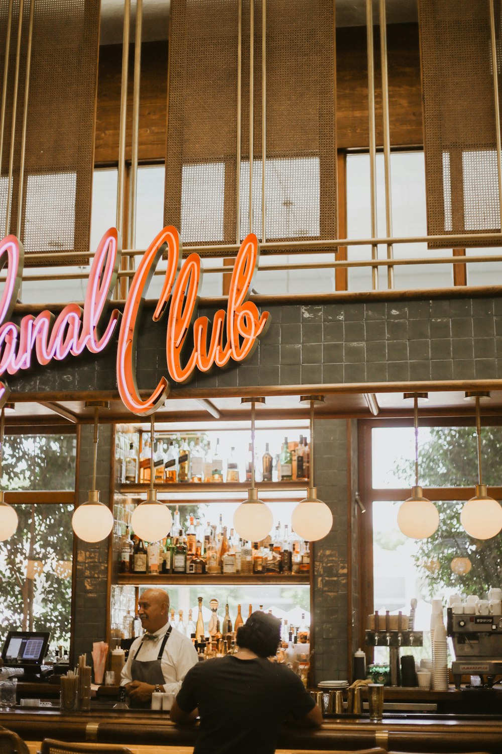 a restaurant with a large sign