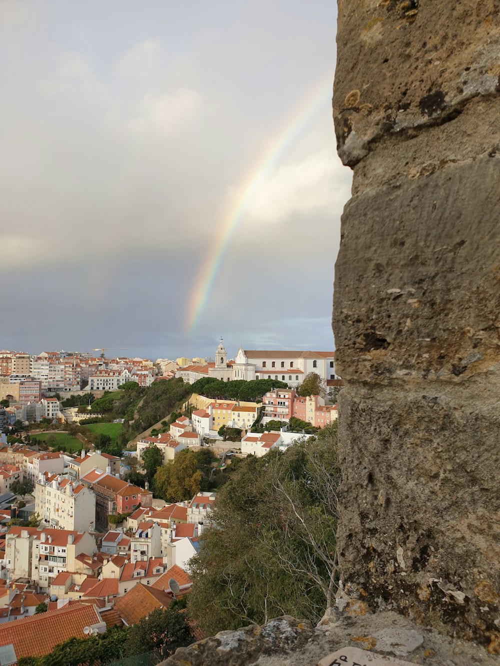 a rainbow over a city