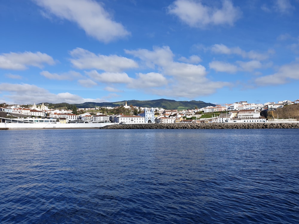 a body of water with buildings along it