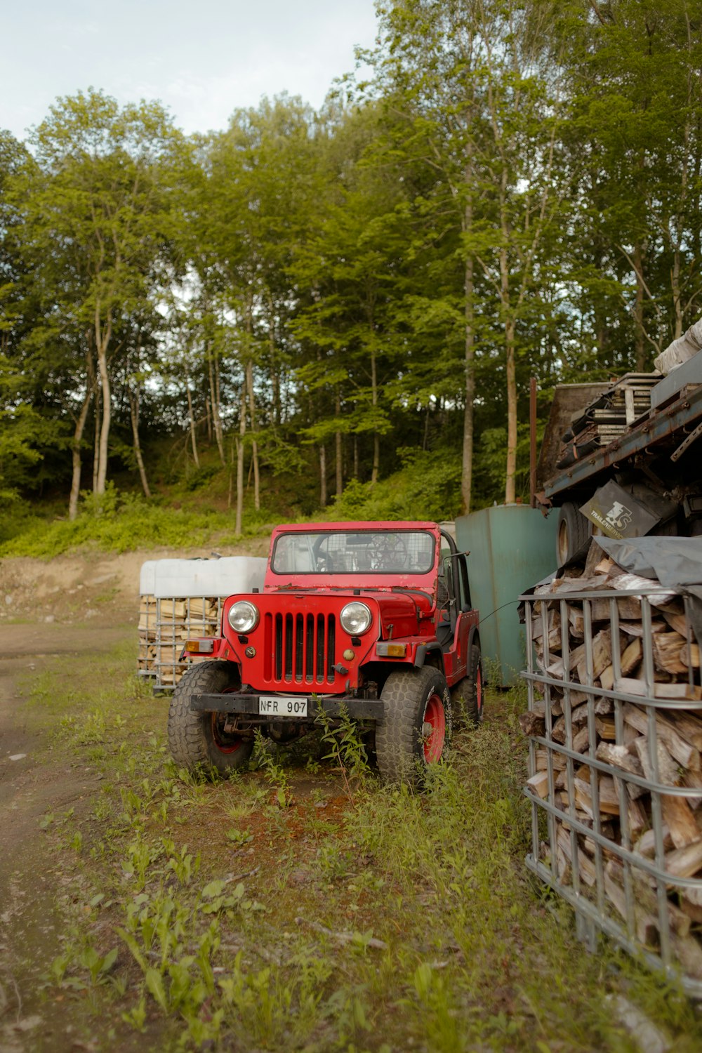 a red truck parked on the side of a road