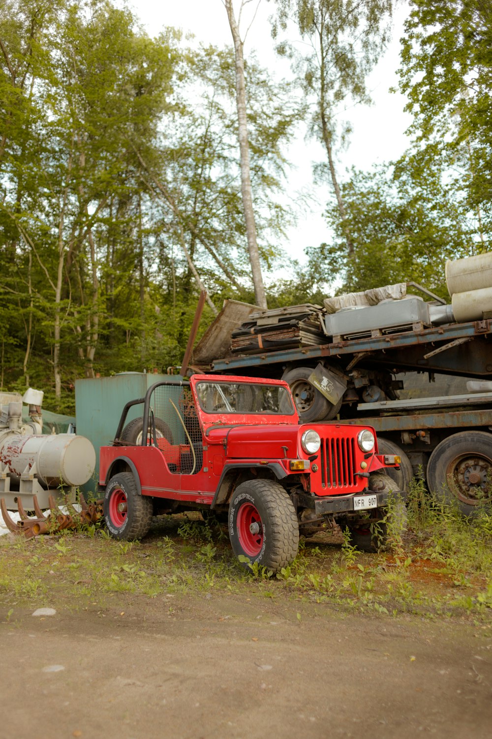 a red truck with a large load
