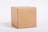 A plain, brown cardboard box placed against a light gray background. The box appears simple and unadorned, showing sharp edges and a smooth surface.