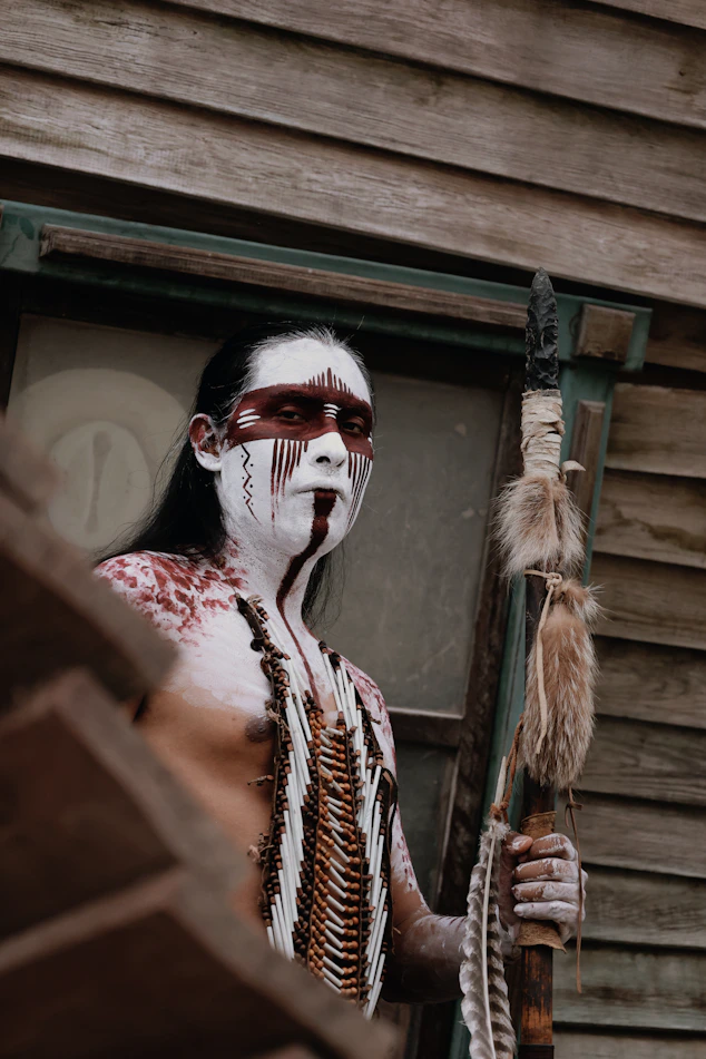 a person holding a stick