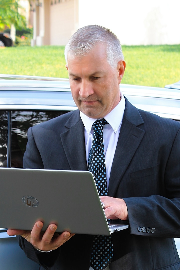 Business owner reviewing ad layout on a tablet