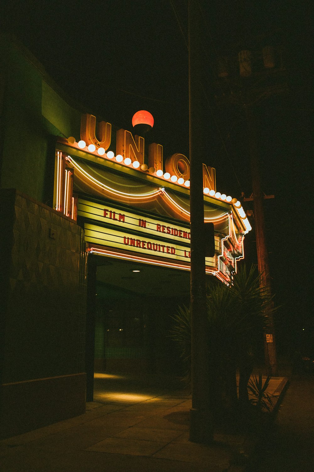 a building with a sign on the roof