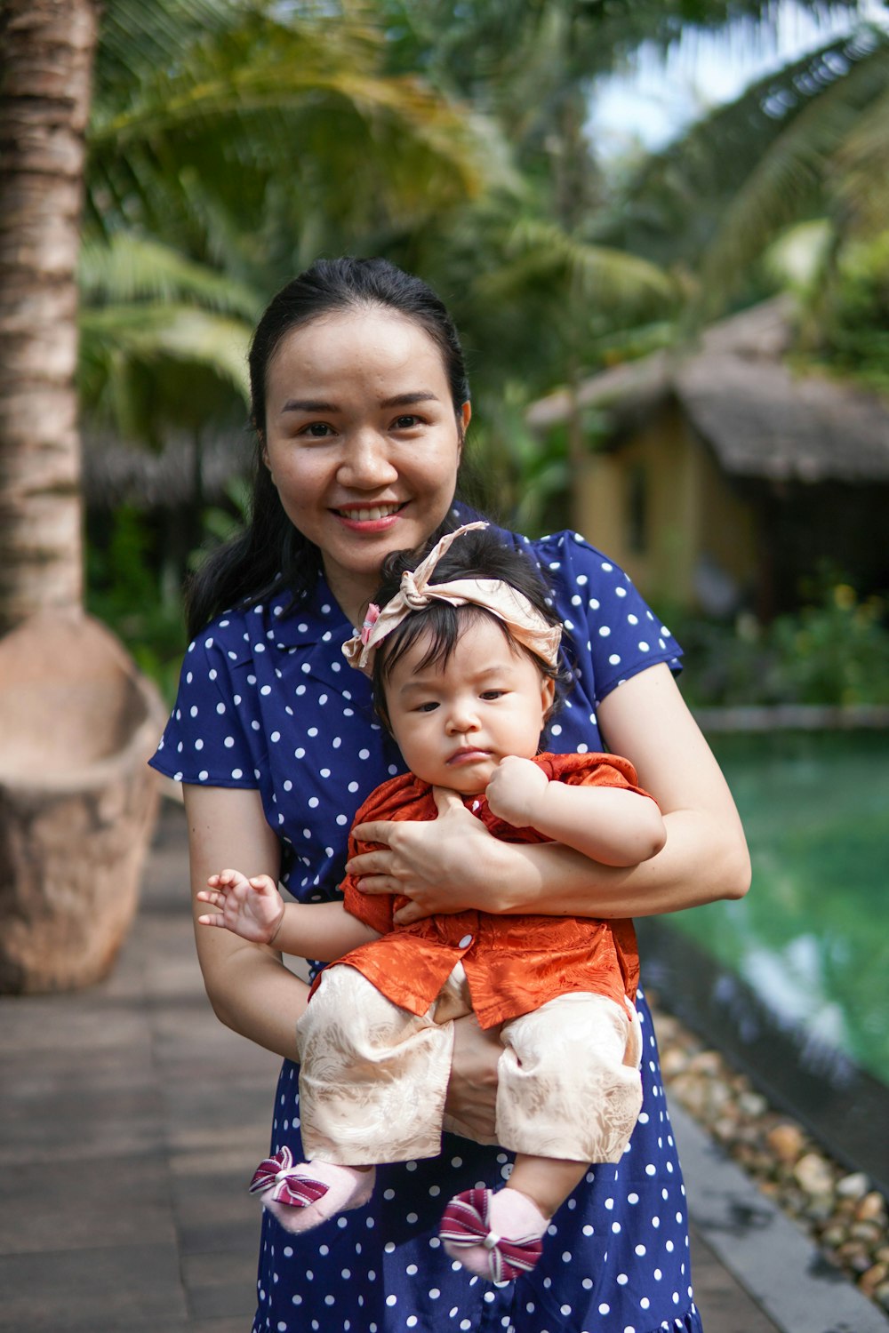 a person holding a baby