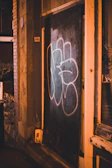 Nighttime shot of a Stilex steel door glowing subtly with ambient lighting, emphasizing luxury and security.