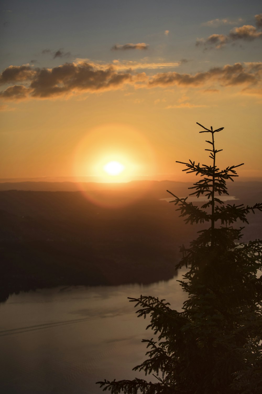 a sunset over a body of water