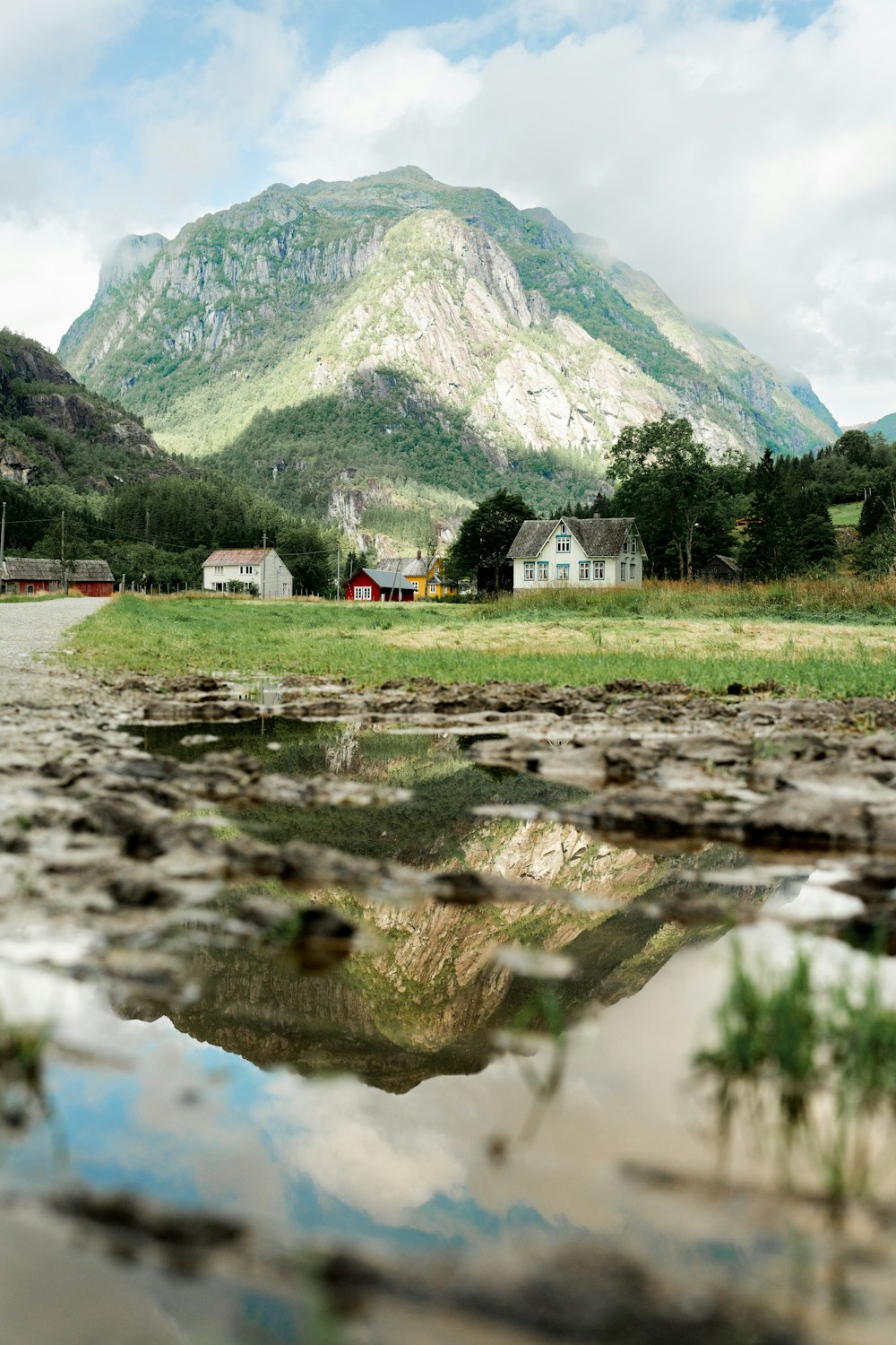 a small town next to a mountain