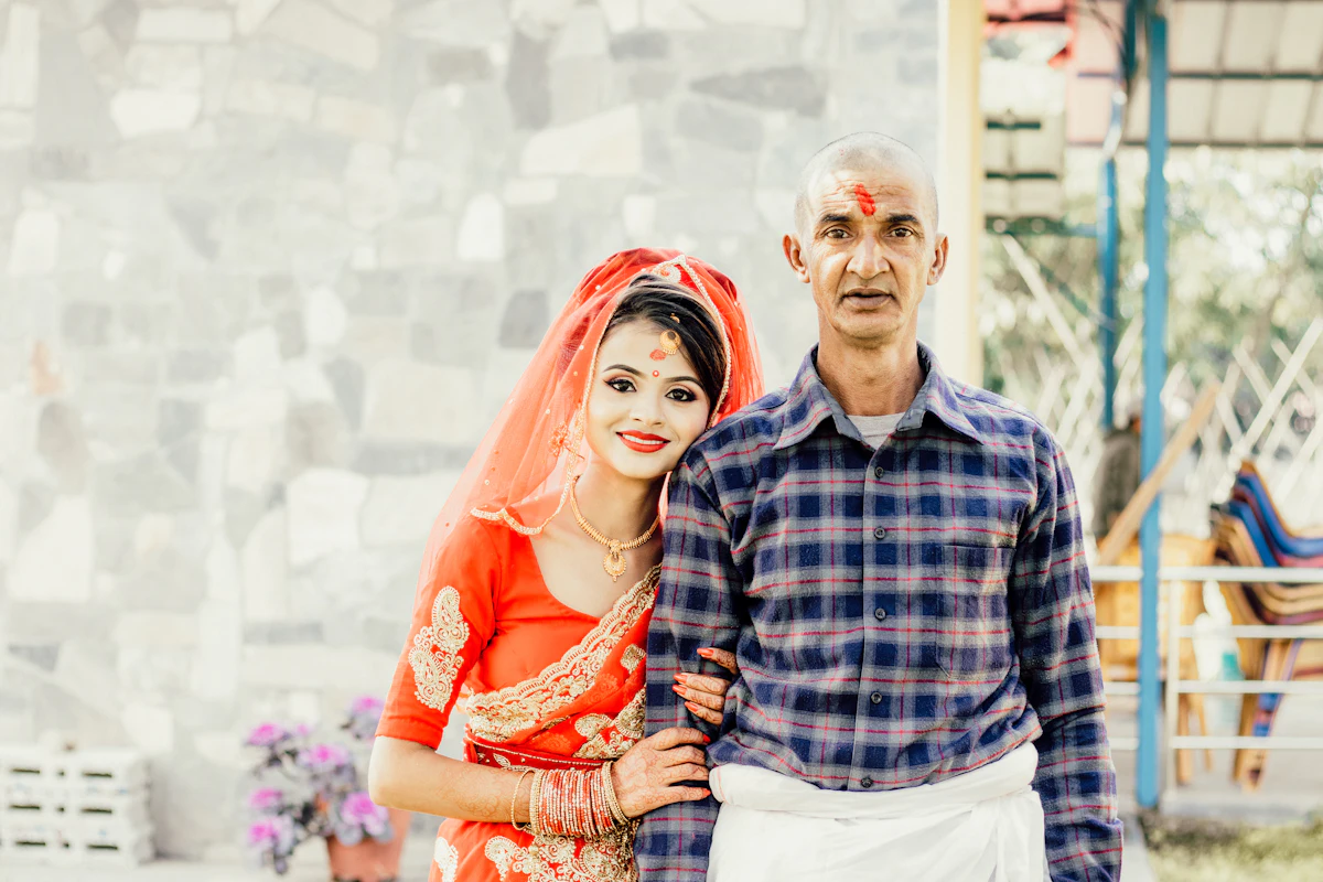 A father with his daughter dressed for her wedding