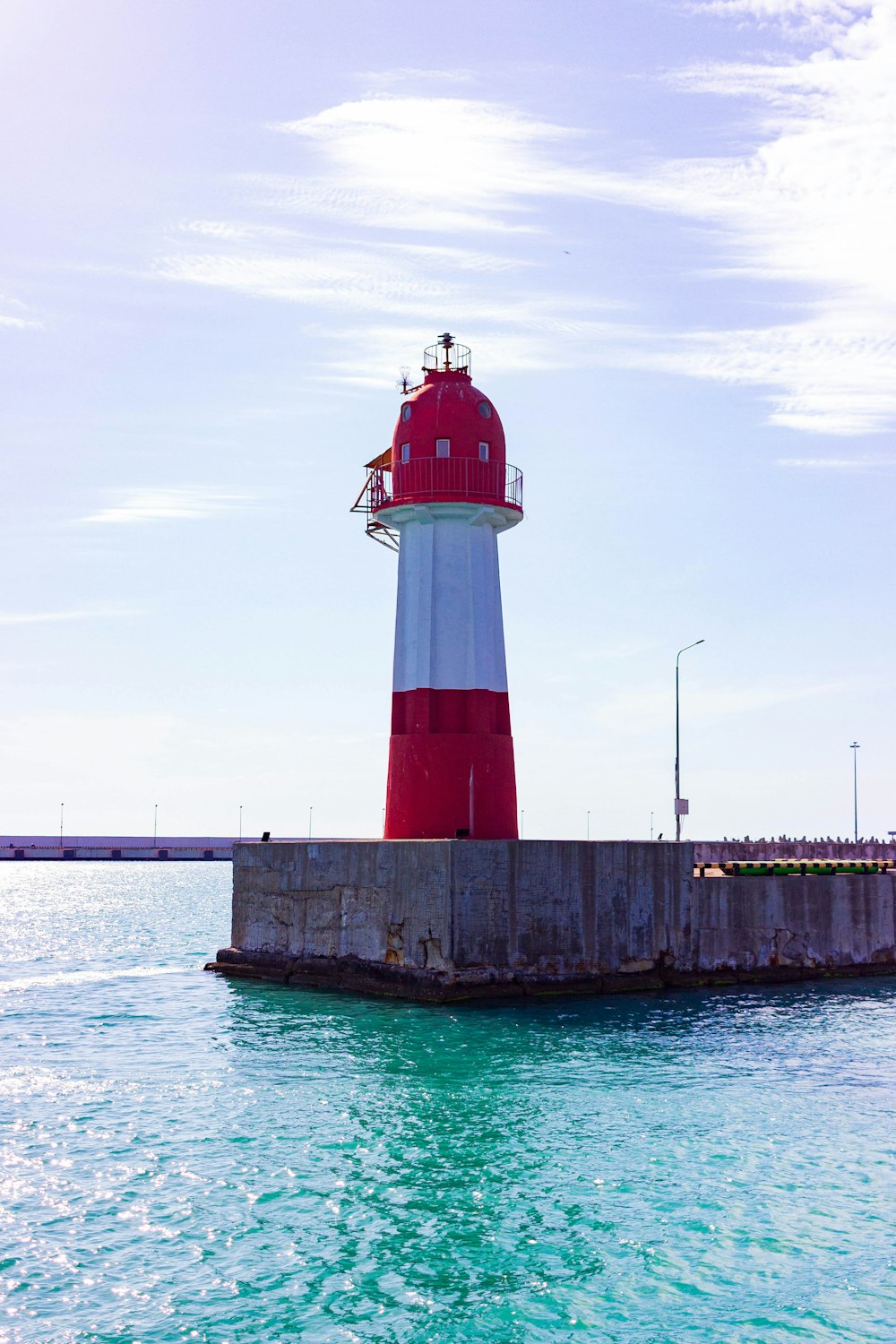 a lighthouse on a dock
