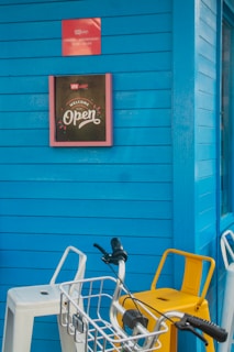 Bright blue and white walls with cheerful signage welcoming customers.