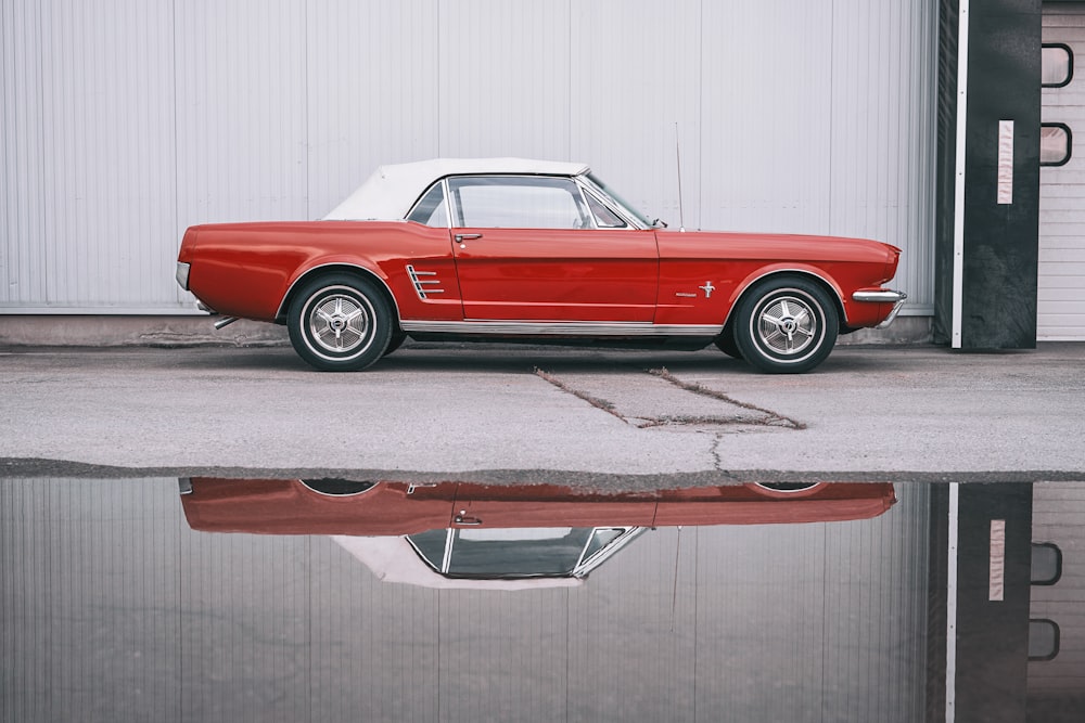 a red car parked in a garage