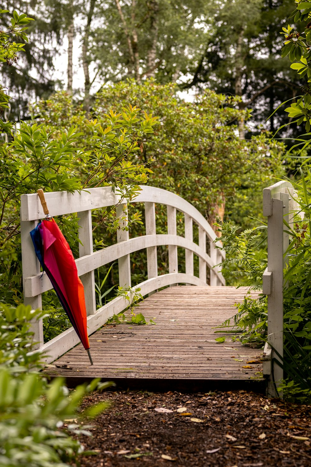 a wooden bridge over a river