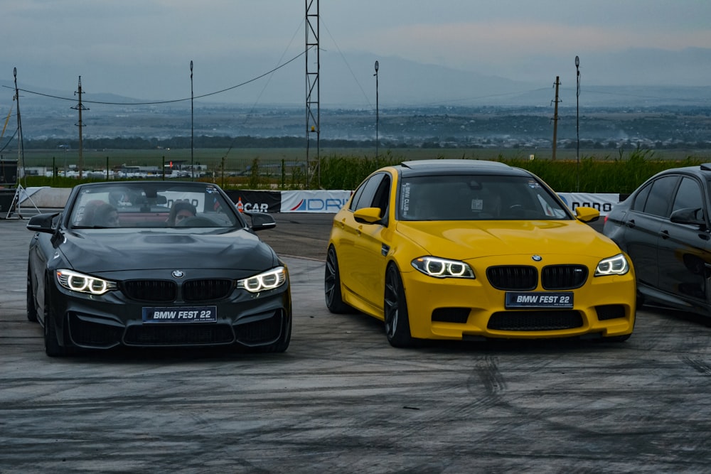 a group of cars parked on a road